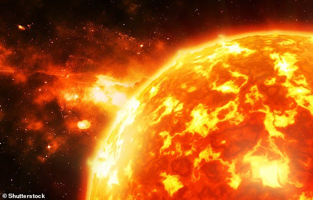 A solar flare is a massive explosion on the sun that occurs when energy stored in 'twisted' magnetic fields is suddenly released (file photo)