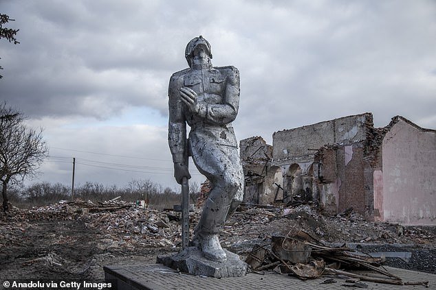 A statue of a soldier among the ruins of Avdiivka, now occupied by Russia