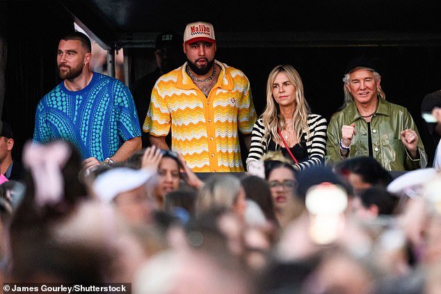 Looking on proudly was Taylor's friend Taylor (left) alongside Ross, who drew a roar from the crowd as he arrived to see the pop star in action.