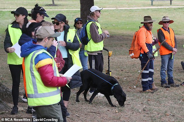 Sniffer dogs were seen in the group as participants prepared for a long day of searching