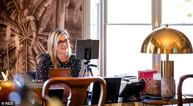 Queen Máxima's home office reveals trendy black and white monochrome wallpaper and gold marble lamps