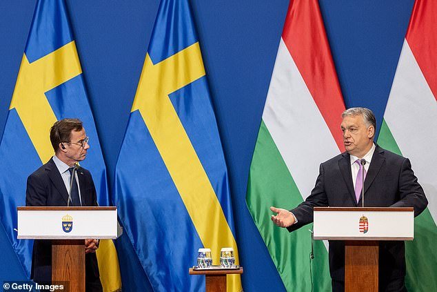 Swedish Prime Minister Ulf Kristersson and Hungarian Prime Minister Viktor Orban hold a press conference on Friday after their meeting in Budapest, Hungary