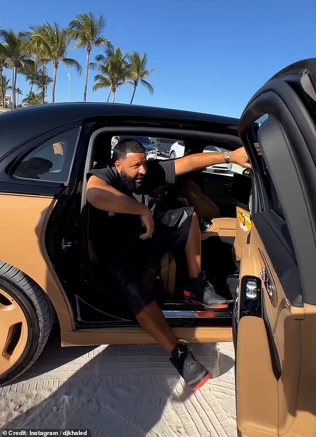 “I don't want to get my Jordans dirty.  Can I ask someone to help me?'  DJ Khaled asked as two of his bodyguards came to his aid in a video the rapper shared on Instagram