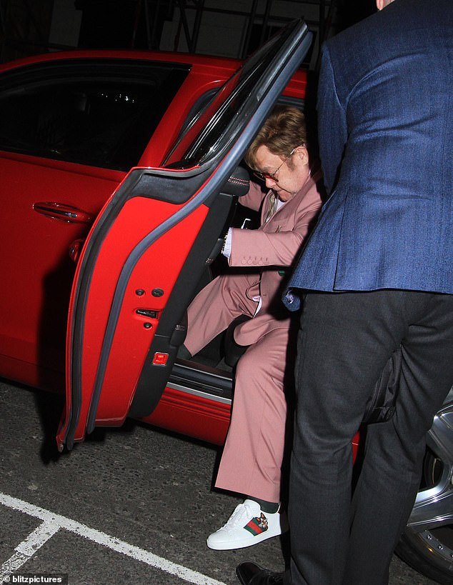 He appeared to be in pain when he got into the car after dinner with friends