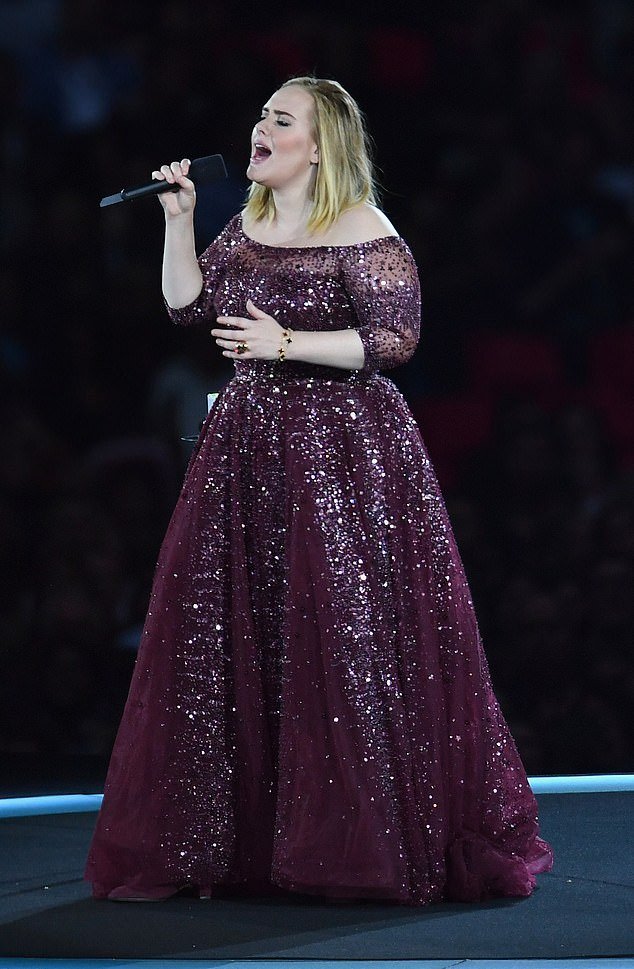 Adele performs at Wembley Stadium on June 28, 2017.  She was forced to cancel the last two dates of this tour after damaging her vocal cords again