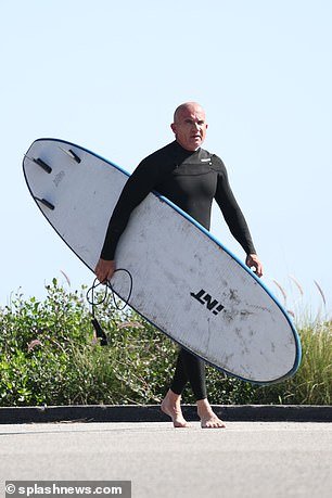 The dysfunctional family drama seemed to weigh heavily on the Prison Break actor, 54, as he tried to escape with a surf session in Malibu on Wednesday.