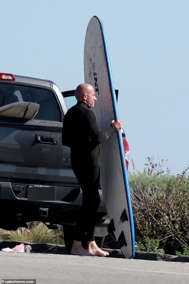He had several surfboards in his pickup and was seen taking one out to get it ready for the waves
