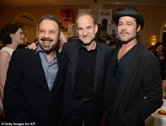 He recalled one of their on-set written 'dustups' in which they reportedly 'yelled, swore and threw chairs' and that it was 'not the last time this happened';  (L-R) Zwick, Marshall Herskovitz and Pitt in 2015