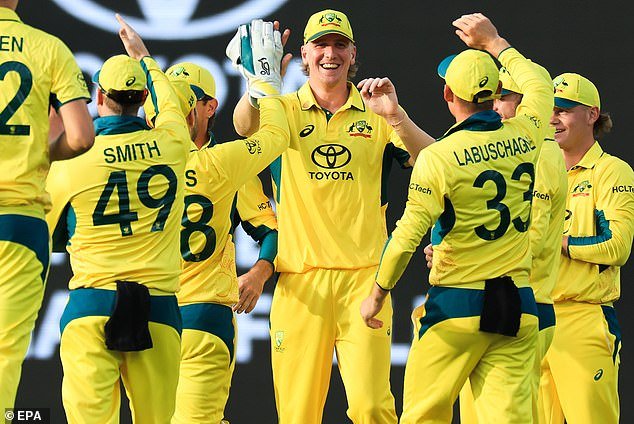 Will Sutherland celebrates with teammates during the second ODI on Sunday