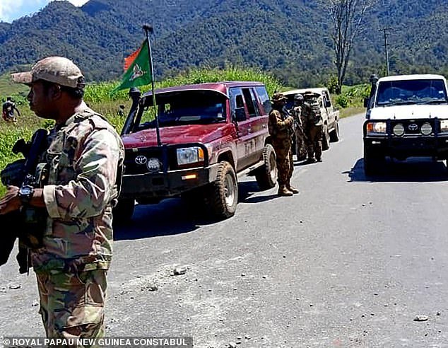 Police say at least 49 people have been killed in an ambush in PNG's remote highlands as bloody tribal war escalates