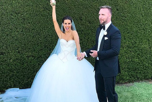 Lauren Phillips' ex-husband Lachlan Spark has taken a cheeky swipe at their failed marriage on Valentine's Day.  Pictured on their wedding day in 2017