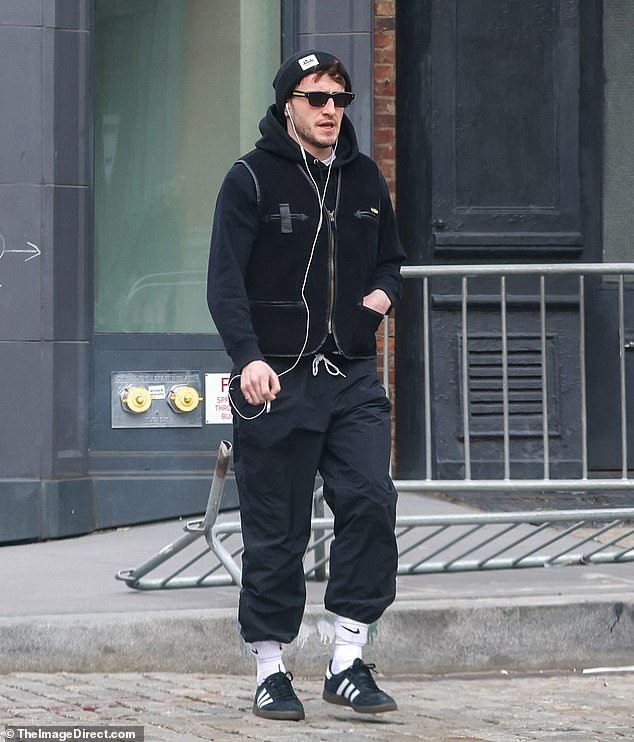 Paul Mescal, 28, looked casual in a trendy black jacket and pants as he went for a brisk walk in New York City on Monday