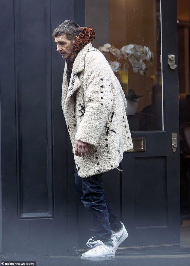 The actor, 48, dressed in a thick cream fleece, leopard print hood and jeans as he picked up a pastry from a bakery.