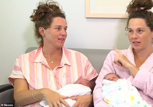 Identical twins Nicole (pictured left) and Renee Baillie (right) gave birth to their babies 22 minutes apart on Wednesday