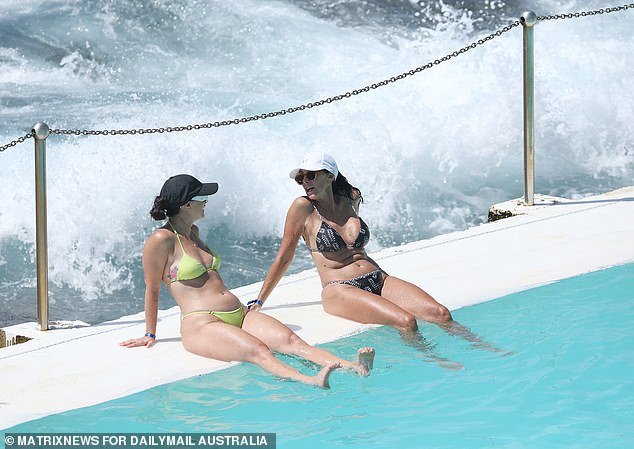Sydneysiders flocked to Bondi Beach on Thursday to escape the sweltering heat as parts of inland NSW reached 40 degrees