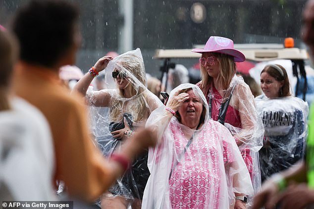 Taylor Swift fans have been evacuated from Sydney's Accor Stadium after lightning struck nearby - the superstar's performance has now been postponed