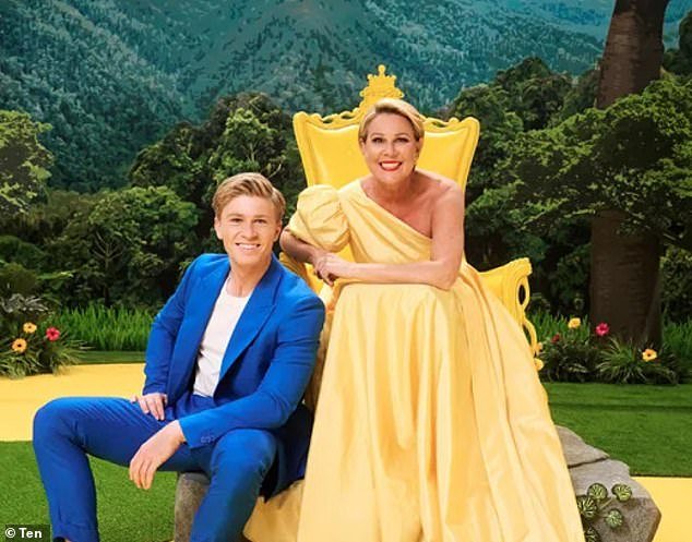 The speculation began after Channel 10 teased fans that the cast of this year's series includes an 'AFL Hall of Famer and premiership player'.  Pictured: I'm a Celebrity...2024 presents Robert Irwin and Julia Morris