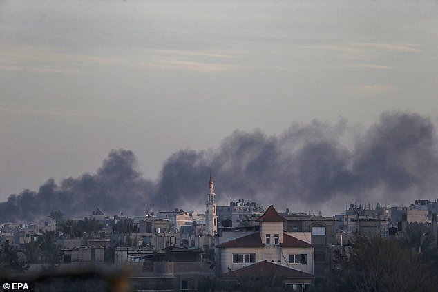 Smoke rises after an Israeli airstrike during a military operation in Khan Yunis, southern Gaza Strip