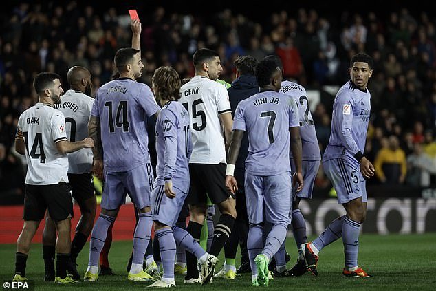 He was later shown a red card for his troubles in chaotic scenes on Valencia's Mestalla pitch