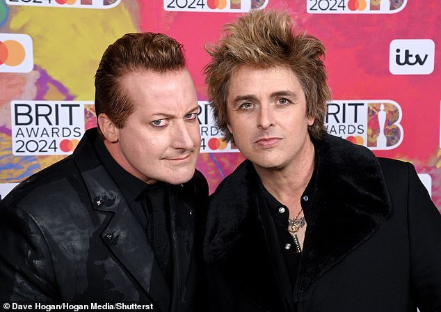 Tré Cool and Billie Joe Armstrong of the American pop punk band attended the awards ceremony to present the award for the best British group, with Roman introducing them