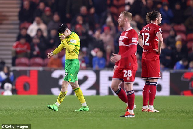 Norwich's Borja Sainz trudges off after being dismissed for kicking out at Jonny Howson