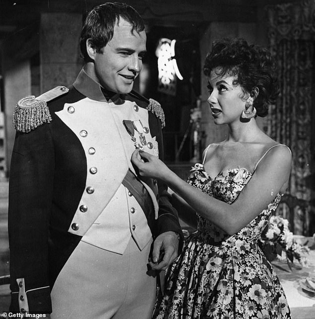 Rita Moreno opens up about her eight-year affair with the late Marlon Brando and reveals he's the one who told her to seek therapy