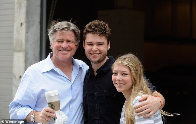 Williams' son Gill Williams (center) said the family did not want to press charges or see Koss jailed.  Pictured: Williams with his son and daughter Ellie Williams in 2012