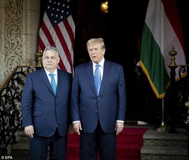 Former President Trump and Hungarian Prime Minister Viktor Orban pose for photos at Trump's Mar-a-Lago estate in Palm Beach, Florida, on Friday evening