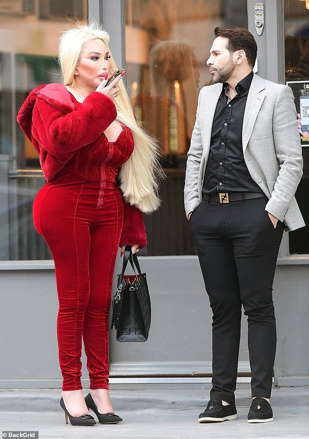The outing came after Jessica put her hourglass figure on display in a £1,700 catsuit as she partied with newly single Carl Woods, Katie's ex-fiancé.