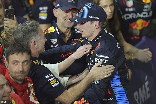 Max Verstappen celebrates after the race with embattled Red Bull team boss Christian Horner and his wife Geri Halliwell