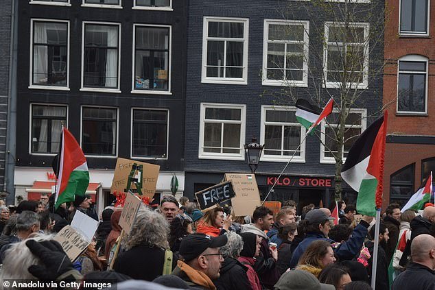 Protesters took to the streets on the same day a National Holocaust Museum opened