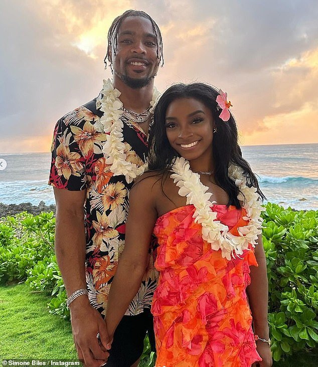 Simone recently cut a vibrant figure in a pink and orange ruffled dress while in Hawaii