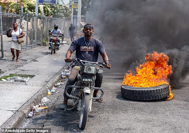 The violence continued on Tuesday even after Haiti's prime minister resigned - at the request of the gangs carrying out the violence