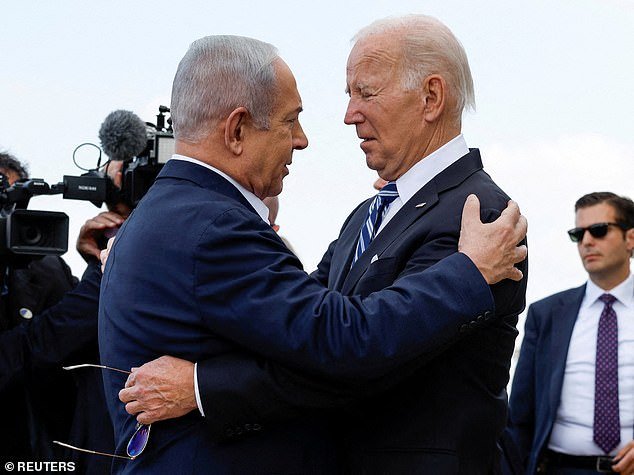 US President Joe Biden is welcomed by Israeli Prime Minister Benjamin Netanyahu as he visits Israel amid the ongoing conflict between Israel and Hamas, in Tel Aviv, Israel, October 18, 2023