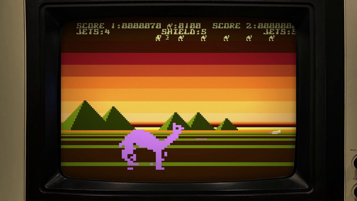 A giant pink camel marches at sunset in front of a stark view of pyramids in Attack of the Mutant Camels
