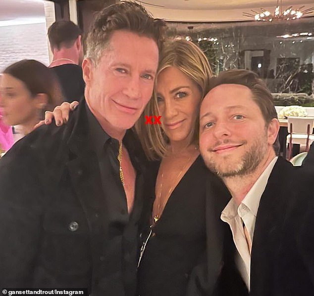 Jennifer Aniston is seen at an Oscars watch party with Bruce Bozzi and writer Derek Blasberg