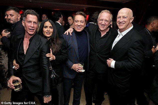 From left to right: Bruce Bozzi, Salma Hayek, Kevin Huvane, Fracois-Henri Pinault and Bryan Lourd attend the CAA pre-Oscar party at Sunset Tower in Los Angeles, where Maher was a no-show