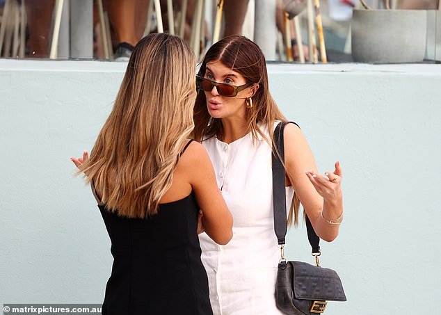 Lauren looked seemingly annoyed as she gestured while having a 'heated' conversation with Sara outside the popular Sydney venue