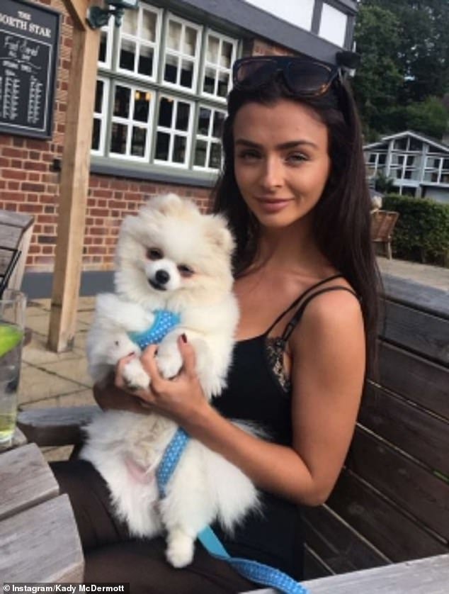 The Love Island star, 28, argued that pet owners don't need to book annual leave for their sick pet and that employers should be more lenient (pictured with her dog Cobi in 2017)
