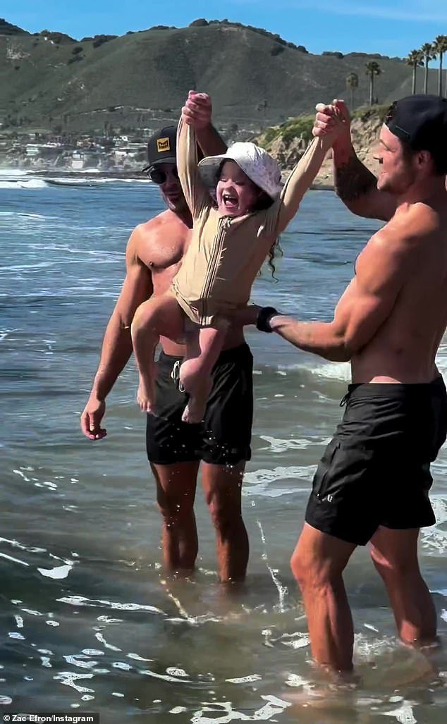 In the footage, he put his washboard abs on full display while rocking just a pair of black trunks and a baseball cap.