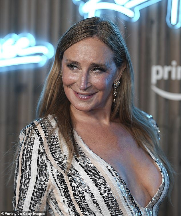 The 60-year-old former Real Housewives star turned heads in a plunging white mini dress covered in silver sequins
