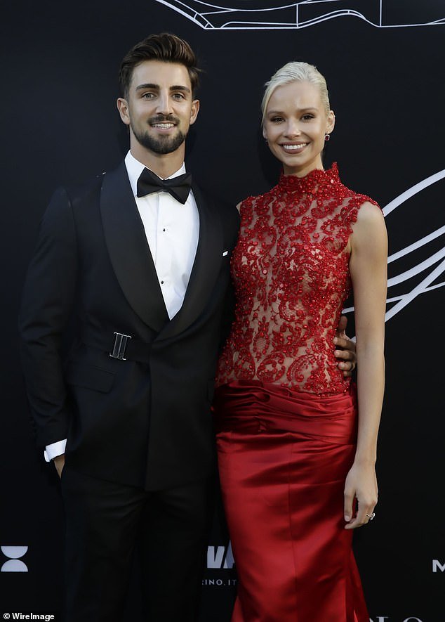 The AFL star was joined by girlfriend Annaise Dalins, who looked divine in red