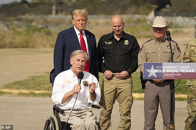 Texas Governor Greg Abbott (center) signed SB4 into law and hosted former President Donald Trump in Eagle Pass, Texas, last month