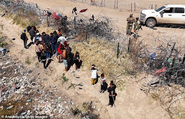 Migrants attempt to cross the North American side of the border between El Paso and Ciudad Juarez, Mexico, in Texas, United States on March 3, 2024