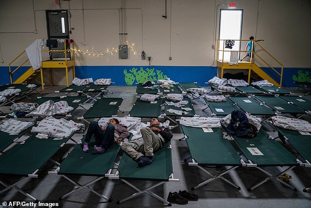 The surge of migrants in Texas has created a huge burden on the state and on the nonprofits that help migrants.  In the photo above, migrants rest on cots at a shelter in El Paso, Texas