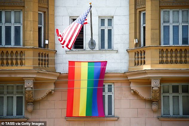 An American flag and an LGBTQ Pride flag on the facade of the U.S. Embassy in Moscow on June 25, 2020