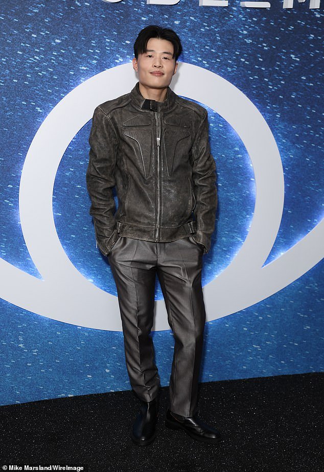 Your series four star Aiden Cheng looked handsome in a gray biker jacket, shiny gray pants and black shoes