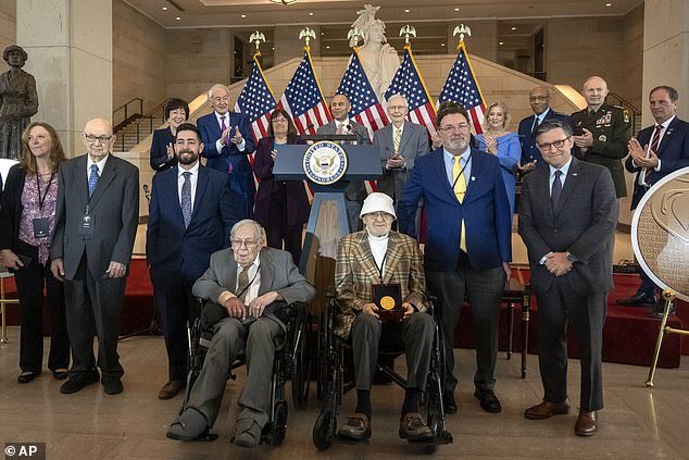 Members of the Ghost Army join military and congressional officials to receive the Congressional Gold Medal during a ceremony on Capitol Hill
