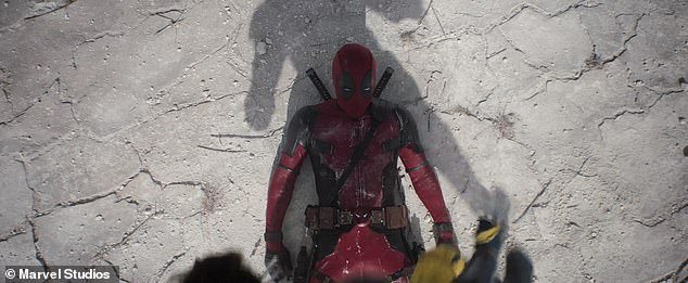 The end of the trailer teases Hugh's return as Wolverine as he looms over Deadpool (Ryan) in a fight scene and shows off his claws