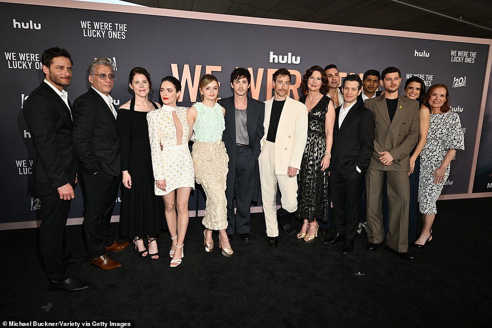 The LA native and Lerman made sure to pose in a group photo with the cast and crew of We Were The Lucky Ones
